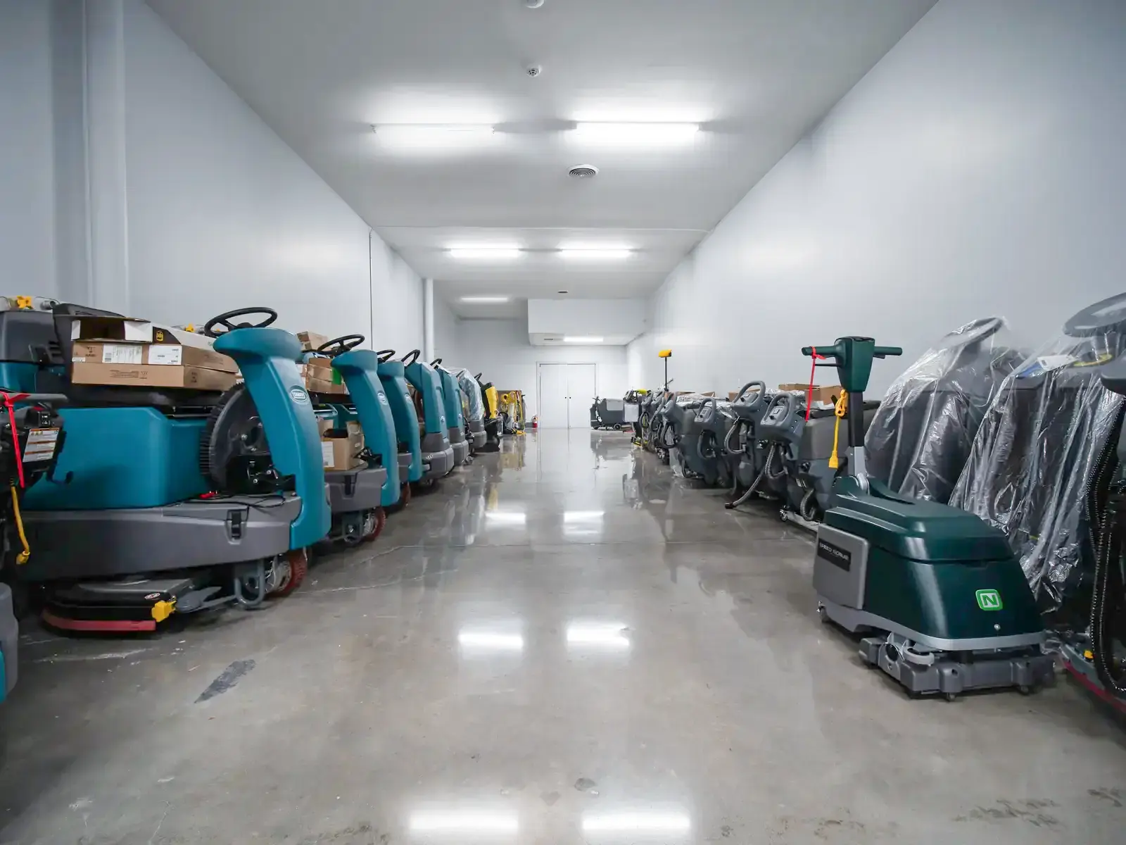 Row of commercial floor scrubbers in the SES fleet